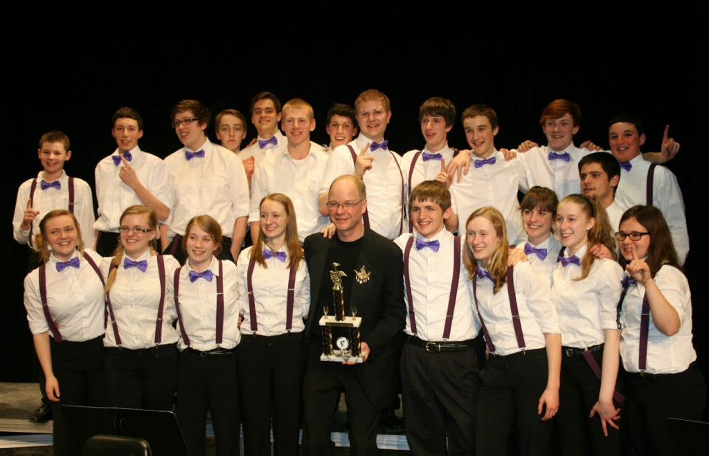 The John Bapst Jazz Ensemble with the Division III First Place Trophy.