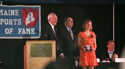 Adrienne Carmack receives her commendation at the 2013 Maine Sports Hall of Fame award ceremony. Five high school student-athletes received $5,000 scholarships from the Hall for their athletic and academic achievements and community involvement.